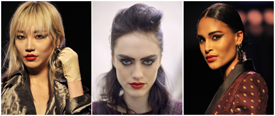 Modelki z pokazu Jean Paul Gaultier mocno pomalowane (czerwona usta i ciemne oczy).