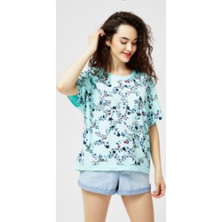Bluzka damska niebieska w kwiaty z krótkimi rękawami casual  - zdjęcie produktu