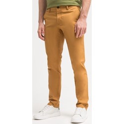 Pomarańczowe spodnie męskie Timberland casual  - zdjęcie produktu