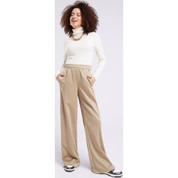 Spodnie damskie beżowe Nike na wiosnę  - zdjęcie produktu