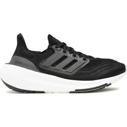 Buty sportowe damskie Adidas na płaskiej podeszwie sznurowane  - zdjęcie produktu