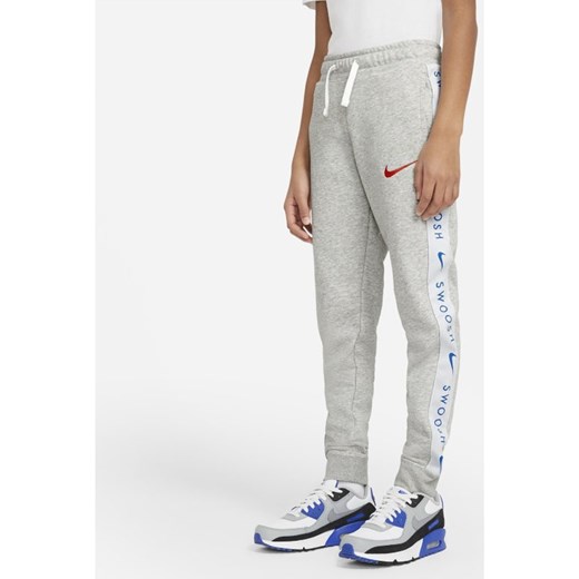 Spodnie chłopięce Nike z napisami 