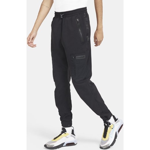 Spodnie męskie Nike czarne z tkaniny 