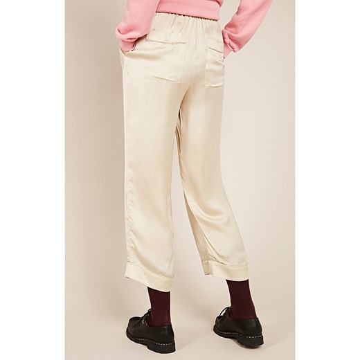 Spodnie "Akining" w kolorze kremowym American Vintage L Limango Polska