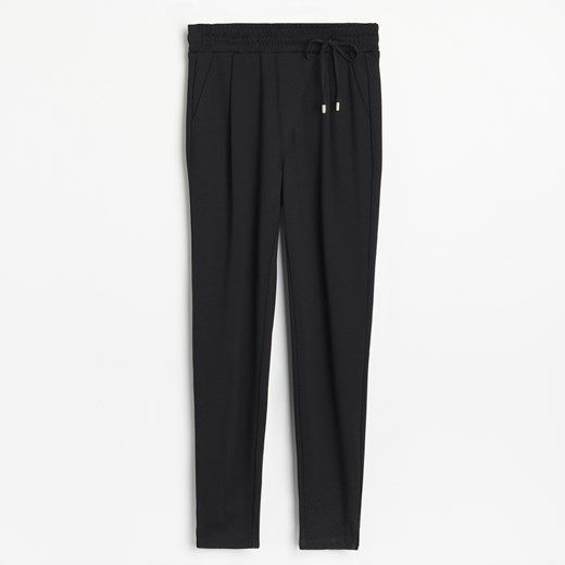 Reserved - Dzianinowe spodnie z elastyczną talią - Czarny Reserved M Reserved
