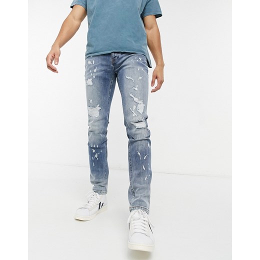 Topman – Jasnoniebieskie obcisłe jeansy z bawełny organicznej z pozszywanymi rozdarciami Topman W32 L30 Asos Poland