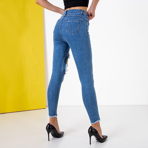 Niebieskie damskie spodnie jeansowe z dziurą - Odzież Royalfashion.pl M - 38 royalfashion.pl