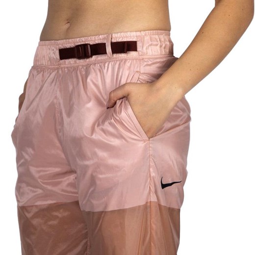 Nike damskie spodnie NSW Tech Pack Pants rose gold Nike M promocyjna cena bludshop.com