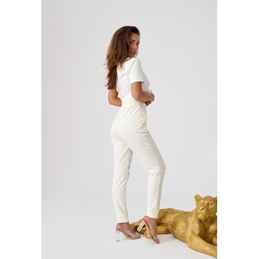 Białe dresowe spodnie damskie z wysokim stanem Gium XL MONNARI