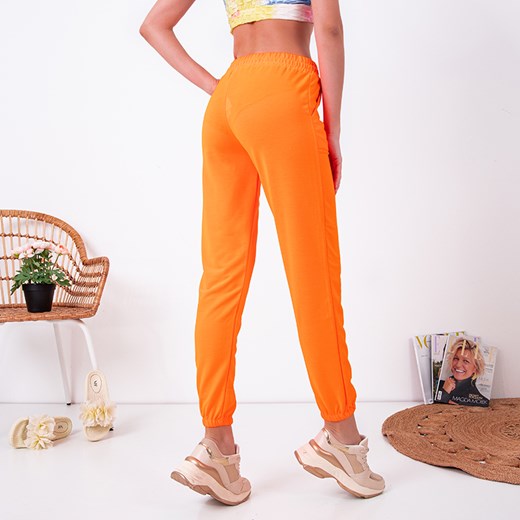 Neonowe pomarańczowe damskie spodnie dresowe - Odzież Royalfashion.pl L - 40 royalfashion.pl