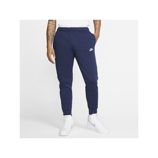 Joggery Nike Sportswear Club Fleece - Niebieski ze sklepu Nike poland w kategorii Spodnie męskie - zdjęcie 126287133
