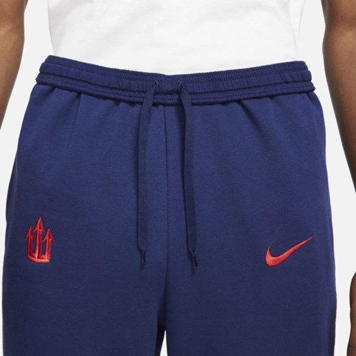 Granatowe spodnie męskie Nike sportowe 