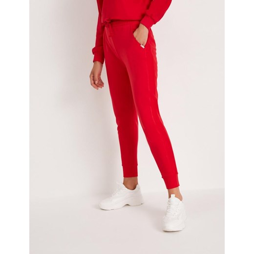 Spodnie dresowe FAMAORI Czerwony XS Diverse XS Diverse okazyjna cena