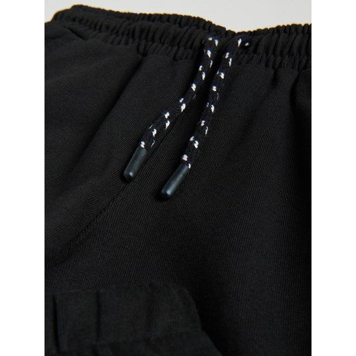 Reserved - Dresowe spodnie z kieszeniami - Czarny Reserved 152 Reserved
