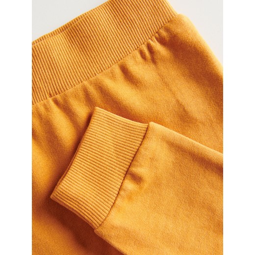 Reserved - Bawełniane spodnie dresowe - Pomarańczowy Reserved 62 Reserved