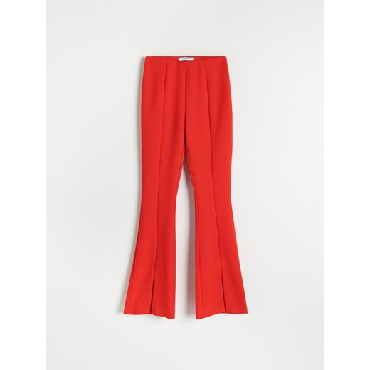 Reserved - Spodnie z rozcięciami - Czerwony Reserved XS Reserved