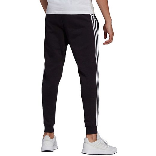 Spodnie dresowe męskie Essentials Slim 3 Stripes Adidas L wyprzedaż SPORT-SHOP.pl