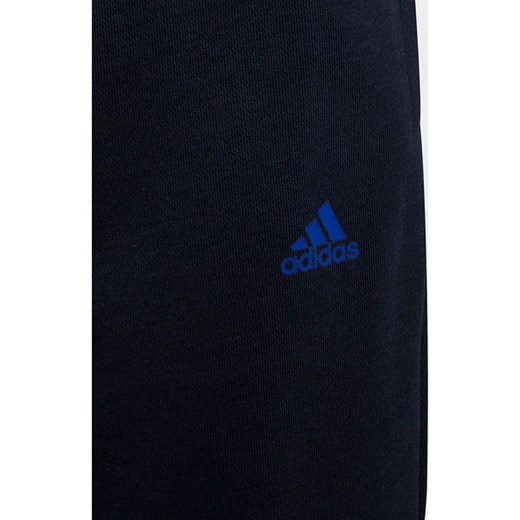 Spodnie dresowe młodzieżowe Essentials French Terry Logo Adidas 140cm promocja SPORT-SHOP.pl