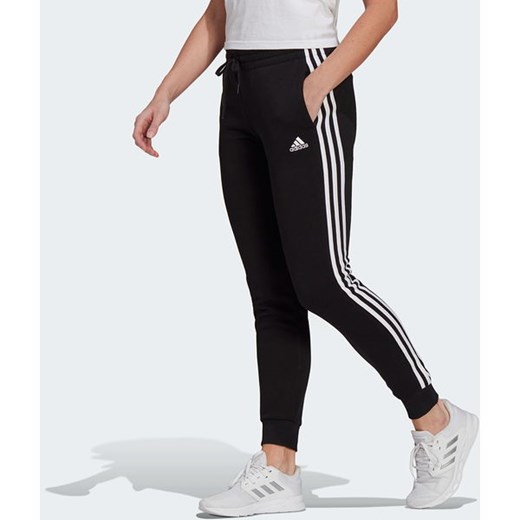 Spodnie dresowe damskie Essentials Fleece 3-Stripes Adidas M wyprzedaż SPORT-SHOP.pl