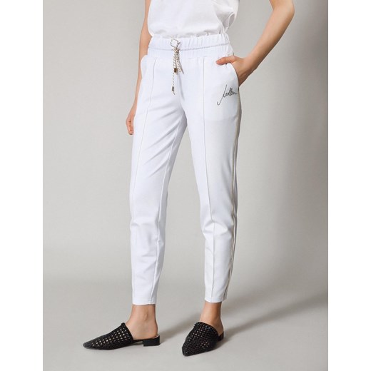 Białe spodnie dresowe w kant Molton S Molton