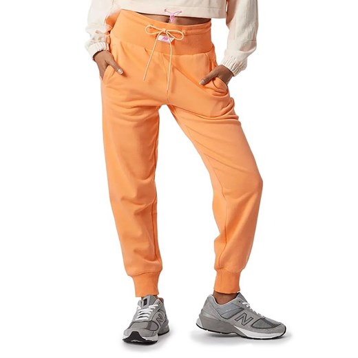 Spodnie dresowe New Balance WP21503PGZ - pomarańczowe New Balance S streetstyle24.pl