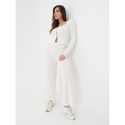 Sinsay - Spodnie flare high waist - Kremowy Sinsay XXS Sinsay