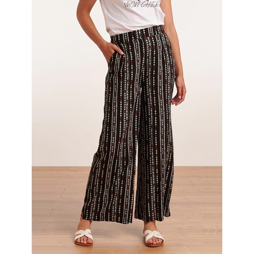 Wzorzyste lejące spodnie Smashed Lemon 22039 ze sklepu Eye For Fashion w kategorii Spodnie damskie - zdjęcie 137182150