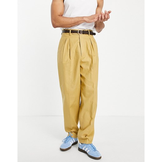 ASOS DESIGN – Musztardowe eleganckie spodnie o dopasowanym kroju z wysokim W34 L34 Asos Poland