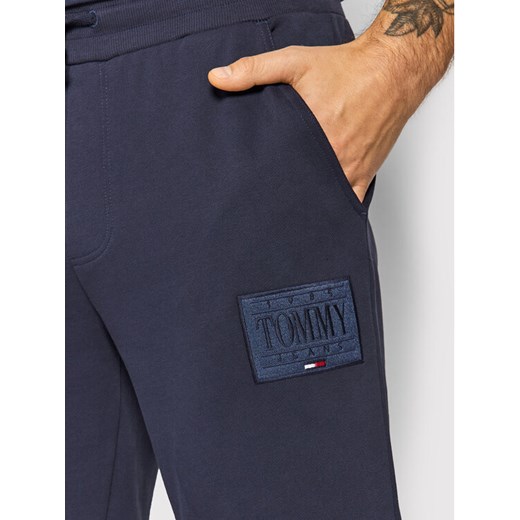 Tommy Jeans Spodnie dresowe Tjm Tonal Logo DM0DM11687 Granatowy Regular Fit Tommy Jeans S promocja MODIVO