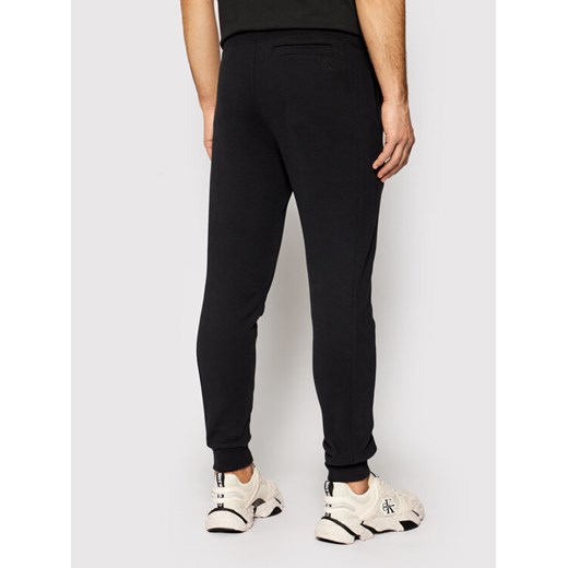 Calvin Klein Jeans Spodnie dresowe J20J215518 Czarny Slim Fit XS promocyjna cena MODIVO