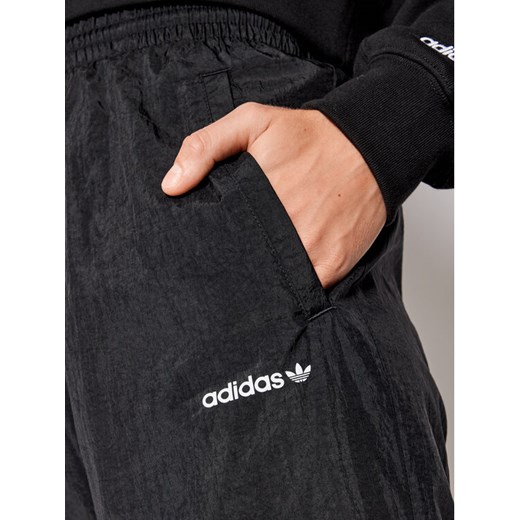 adidas Spodnie dresowe adicolor Shattered Trefoil H22863 Czarny Relaxed Fit 14A okazja MODIVO