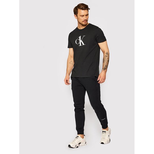 Calvin Klein Jeans Spodnie dresowe J20J215518 Czarny Slim Fit XS wyprzedaż MODIVO