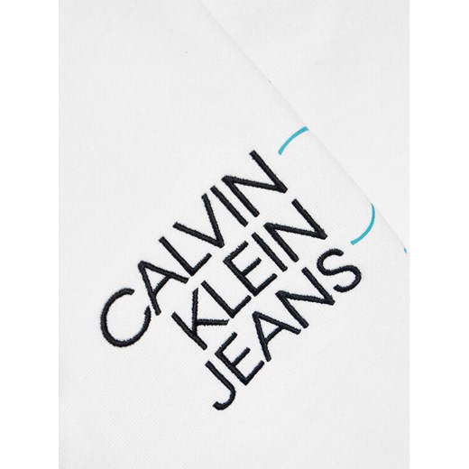 Calvin Klein Jeans Spodnie dresowe Hybrid Logo IB0IB00780 Biały Regular Fit 6Y okazyjna cena MODIVO