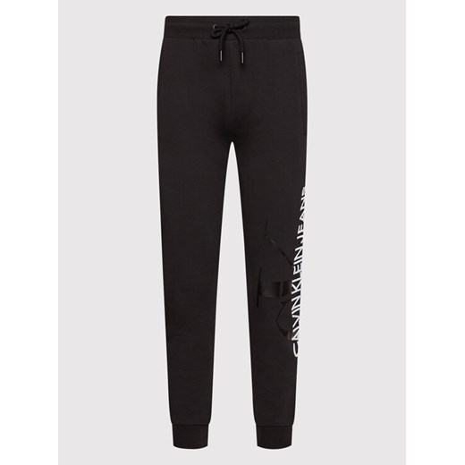 Calvin Klein Jeans Spodnie dresowe J20J21658 Czarny Regular Fit L okazyjna cena MODIVO
