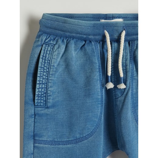 Reserved - Bawełniane spodnie z kieszeniami - Niebieski Reserved 104 Reserved