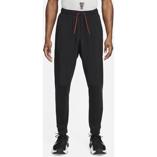 Męskie spodnie treningowe o zwężanym kroju Nike Dri-FIT - Czerń Nike XL Nike poland