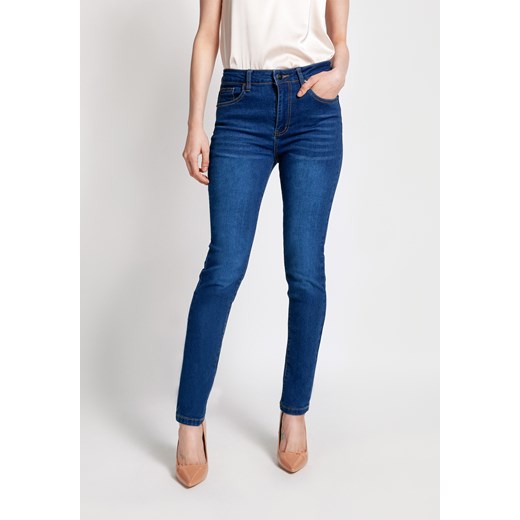 Granatowe jeansy slim z przetarciami ze sklepu Molton w kategorii Jeansy damskie - zdjęcie 139775681