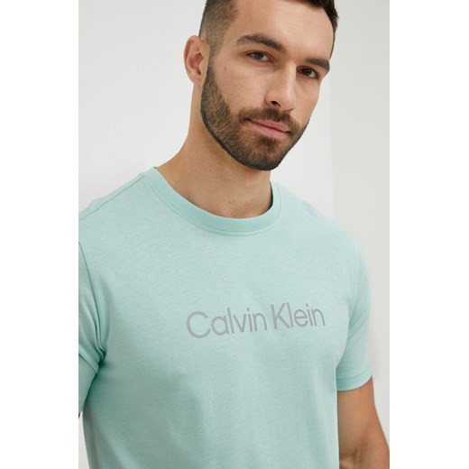 Calvin Klein Performance t-shirt treningowy CK Essentials kolor turkusowy z S ANSWEAR.com promocyjna cena