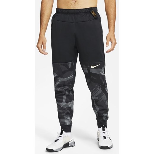 Męskie spodnie treningowe o zwężanym kroju ze wzorem moro Nike Therma-FIT - Nike M okazyjna cena Nike poland