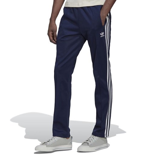 Spodnie dresowe adidas Originals Adicolor Classic Beckenbauer Primeblue Track HK7372 - granatowe ze sklepu streetstyle24.pl w kategorii Spodnie męskie - zdjęcie 141981232