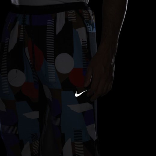 Męskie spodnie do biegania Nike A.I.R. Hola Lou - Czerń Nike XL Nike poland
