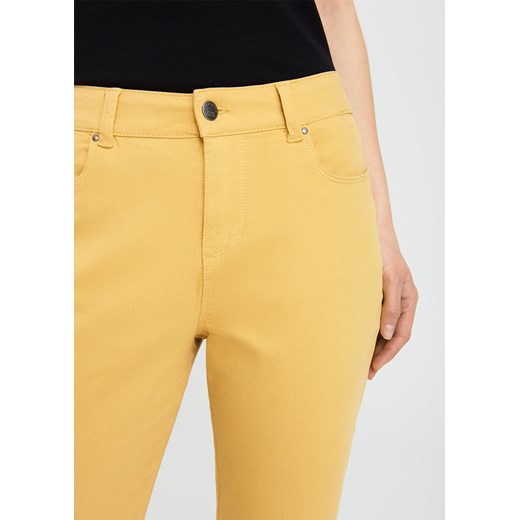 Spodnie bawełniane slim fit żółte Greenpoint 44 Happy Face
