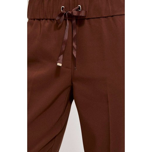 Spodnie z prostą nogawką 3900, Kolor brązowy, Rozmiar XS, Moodo L Primodo
