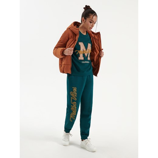 Pikowana kurtka z kapturem pomarańczowa - Różowy House XS House