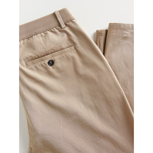 Reserved - Spodnie chino slim z bawełną - Beżowy Reserved 34 Reserved
