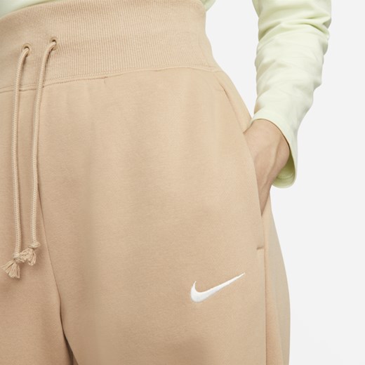 Damskie spodnie dresowe z wysokim stanem i szerokimi nogawkami Nike Sportswear Nike L Nike poland