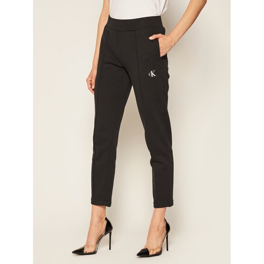 Calvin Klein Jeans Spodnie dresowe Back Logo J20J214178 Czarny Regular Fit S okazja MODIVO