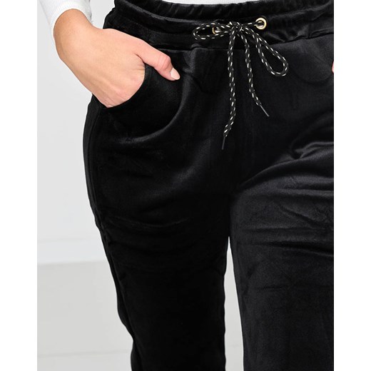 Czarne damskie ocieplane welurowe spodnie dresowe joggery PLUS SIZE - Odzież Royalfashion.pl XL/XXL - 43 royalfashion.pl