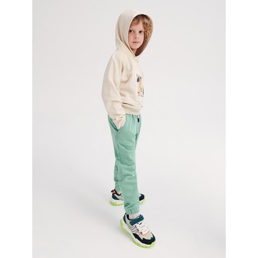 Reserved - Dzianinowe spodnie dresowe - Zielony Reserved 116 (5-6 lat) wyprzedaż Reserved