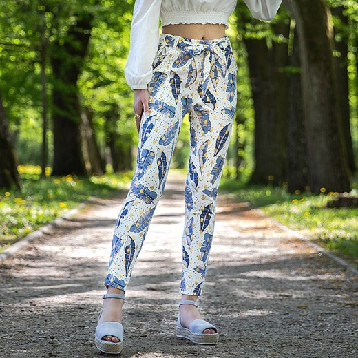 Białe damskie tregginsy w piórka - Odzież Royalfashion.pl L/XL - 41 royalfashion.pl